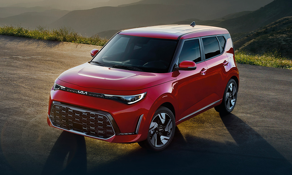 A red Kia Soul in the sunlight